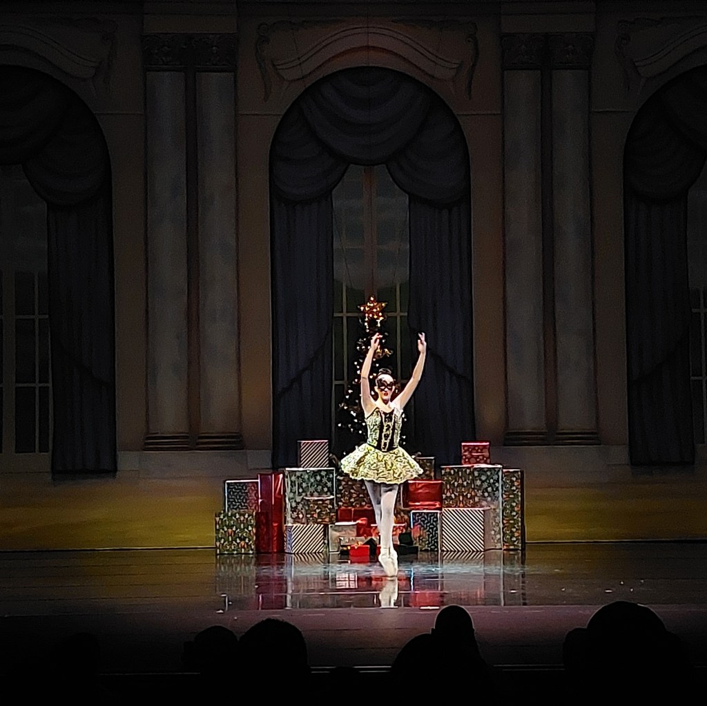 Masked ballet dancer on point